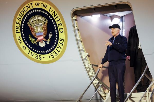 Biden gestures as he deboards Air Force One, at Dover Air Force base in Dover, Delaware, U.S., July 17, 2024.
